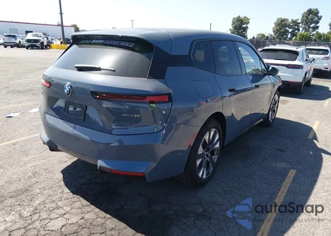 2026 BMW Ix xDrive60 из США, поврежденный, VIN WB553CF08TCV17843